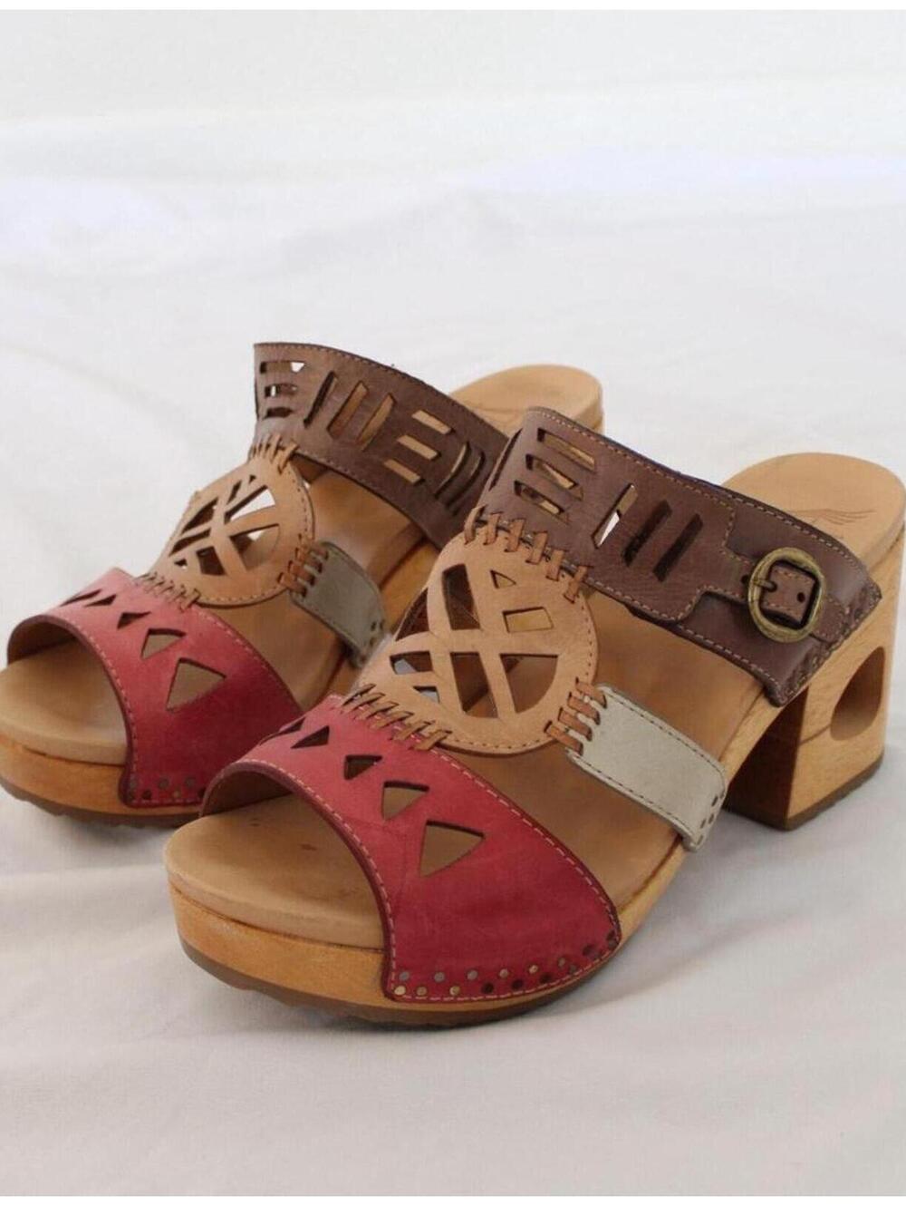 Dansko Oralee clogs with a leather upper with cut-out designs. size US 7.5-8